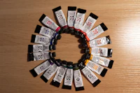 a group of paint tubes arranged in a circle on a table